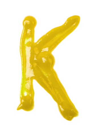Single letter made of sauce isolatedの写真素材