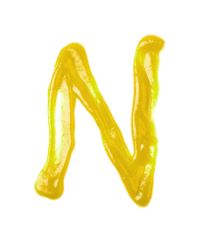 Single letter made of sauce isolatedの写真素材