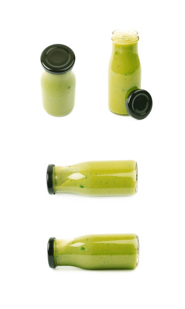 Green sauce in a bottle isolatedの写真素材