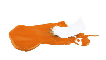 Paint tube in a dye spill isolatedの写真素材