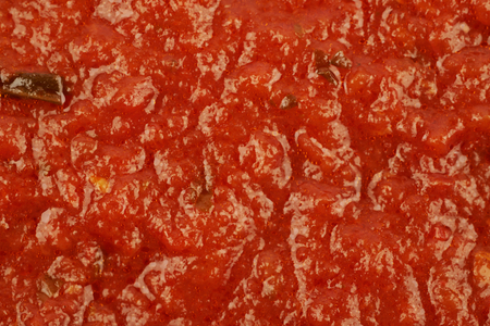 Surface coated with tomato sauceの写真素材