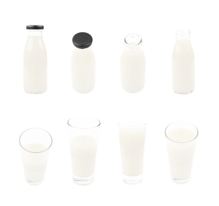 Tall glass and bottle of milk isolatedの写真素材