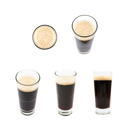 Glass of dark beer isolatedの写真素材