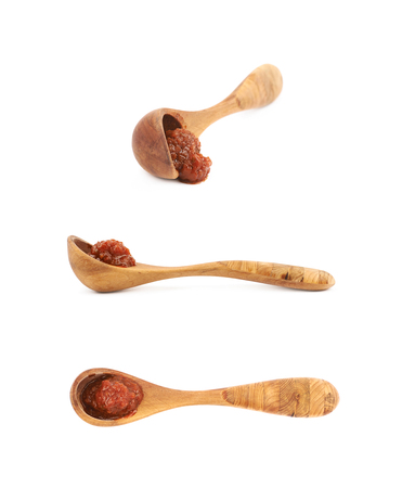 Wooden spoon of marinara sauce isolatedの写真素材
