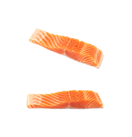 Raw salmon fillet fish isolatedの写真素材