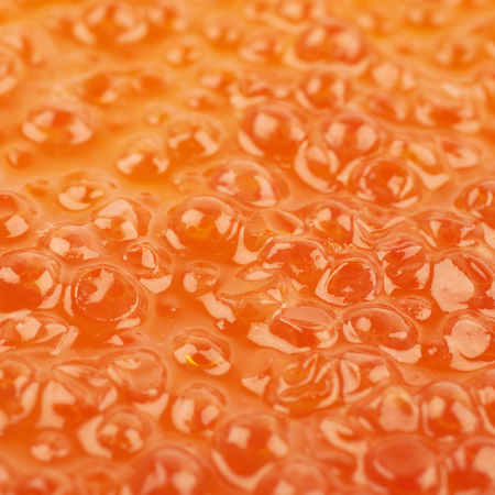 Surface coated with the red caviarの写真素材
