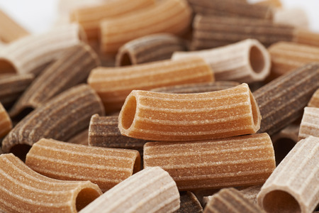Surface coated with the brown pastaの写真素材