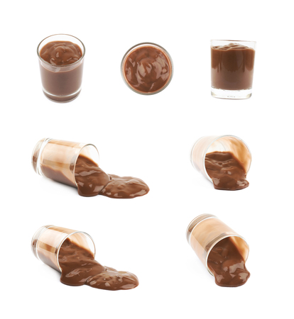 Glass shot of chocolate pudding isolated over the white background, set of seven different foreshorteningsの写真素材