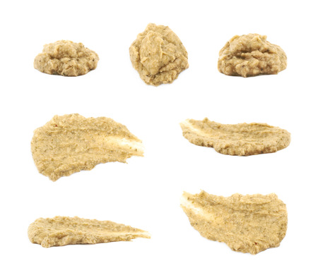 Splash of hummus isolated over the white background, set of seven different foreshorteningsの写真素材