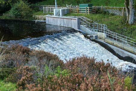 River flowing down the weir at Langsett Reservoir, South Yorkshire. This is at the low bridge.の写真素材