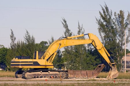 A backhoe at rest at the job site