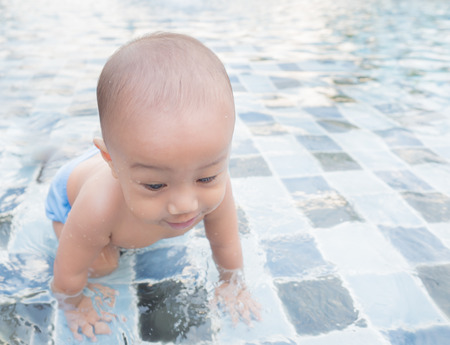 little boy in the swimming poolの写真素材