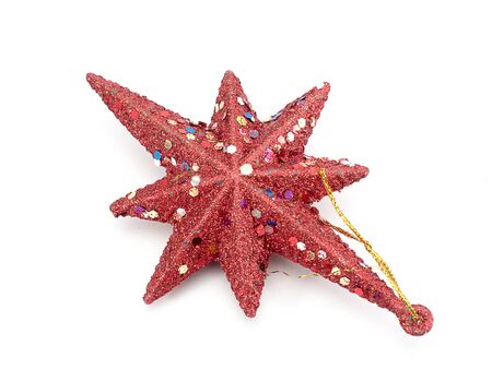 Red Christmas star isolated on white backgroundの写真素材