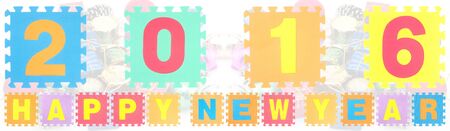 Happy New Year 2016 words made of alphabet puzzle isolatedの写真素材