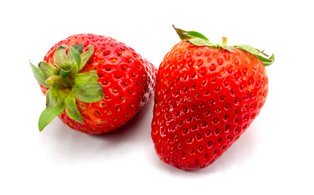 Beautiful strawberries isolated on whiteの写真素材