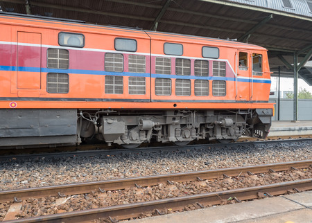 Red orange train, Diesel locomotive, on railway stationのeditorial素材