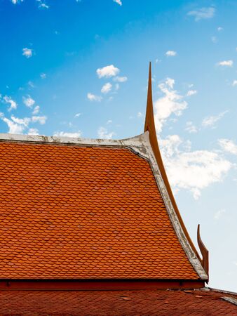 The roofs of Thai house and sky and cloud backgroundの写真素材