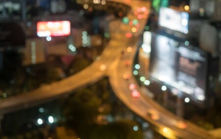 bokeh of Bangkok cityscape night view with twilight sky, expressway and highway top view, Thailandの写真素材