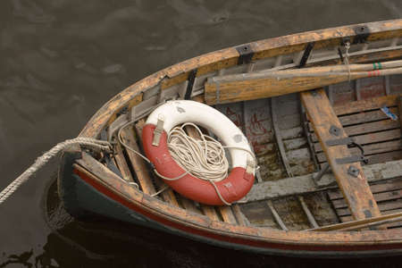 the boat on the river and lifebuoyの写真素材