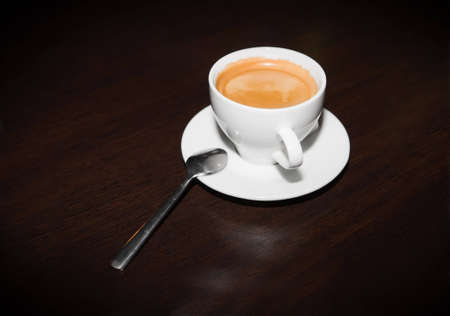 white cup with black coffee espresso の写真素材