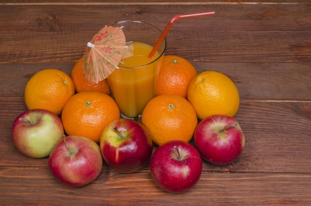 juicy and beautiful fruit on a wooden backgroundの写真素材