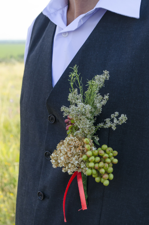 black tuxedo with flower for a wedding ceremonyの写真素材