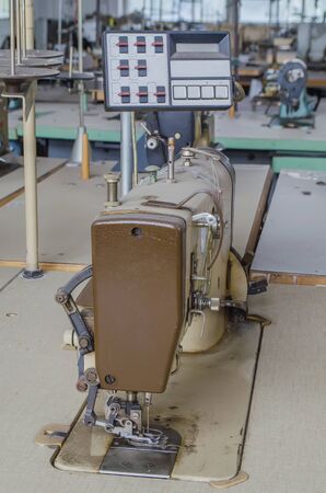 garment factory with the old equipment in the clean roomの写真素材