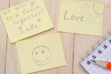 school supplies on a wooden school deskの写真素材