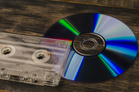 music on the old magnetic cartridge on a wooden table