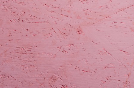 wooden brightly pink background close up top viewの写真素材