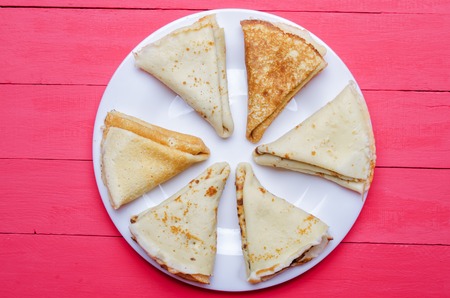 hot fried pancakes on a white plate