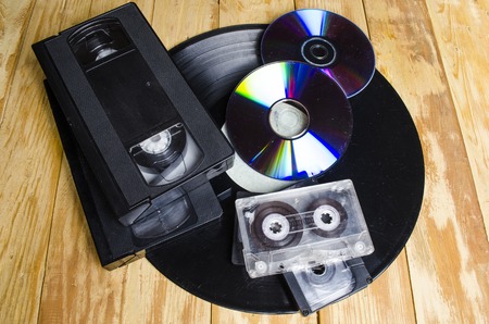 the magnetic cartridge for the tape recorder on a wooden table