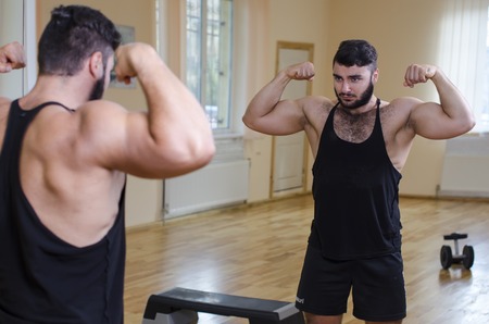athlete in the gym preparing for competitionsの写真素材