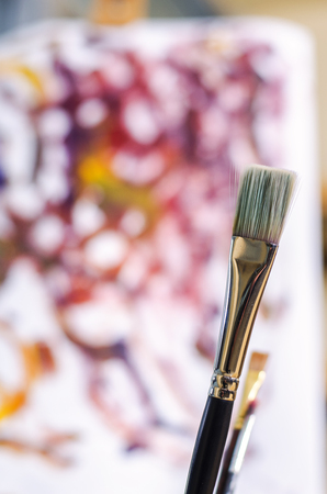 paints and brushes for the artist in the studioの写真素材