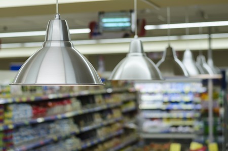 Many lanterns light products in the super marketの写真素材