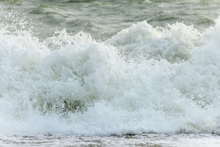 Waves breaking on the beach at the edge of the Atlantic Ocean near Sables d'Olonne in France.の写真素材