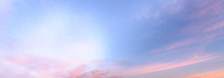 Glowing sky at dusk on a fall evening. Banner, panoramic, panorama.