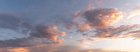 Glowing sky at dusk on a fall evening. Banner, panoramic, panorama.