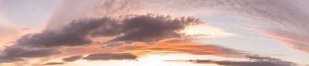 Glowing sky at dusk on a fall evening. Banner, panoramic, panorama.