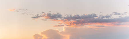 Large pink cloud at sunset in spring. panorama, panoramic, banner. Alsace, France.の写真素材