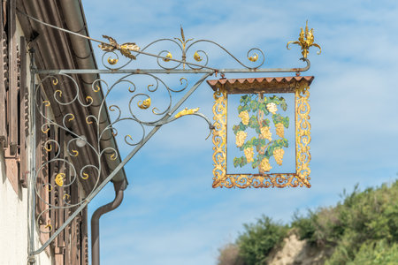 Old signboard of house of winegrower. Bickensohl, Kaiserstuhl, Germany.の写真素材