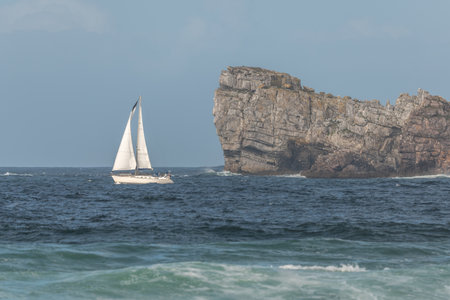 Sailboat sailing offshore on the Atlantic Ocean. Camaret sur mer, Crozon, Finistere, Brittany, Franceの写真素材