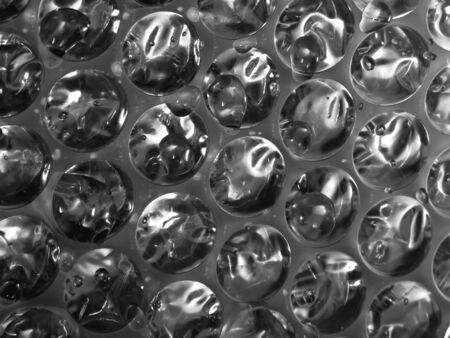 bubble wrap and water dropletsの写真素材