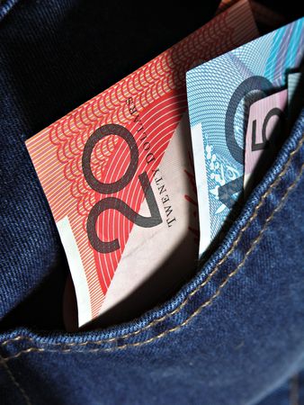 Australian money in jeans pocket