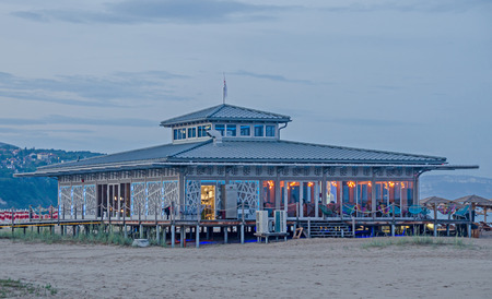 ALBENA, BULGARIA - JUNE 13, 2016. Beach Bar near sea water, lights, night time, party timeのeditorial素材