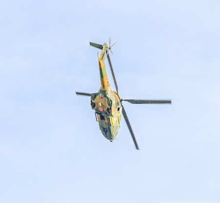 BUCHAREST, ROMANIA - SEPTEMBER 5, 2015. Aerobatic elicopter pilots training in the sky of the city. Puma elicopter, navy, army drill.のeditorial素材