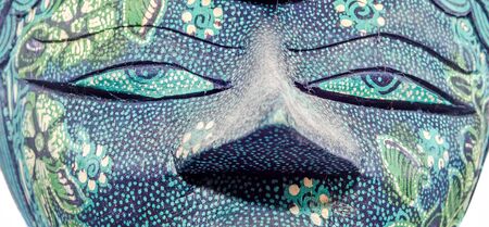 Detail of colored african mask, halloween mask, close upの写真素材