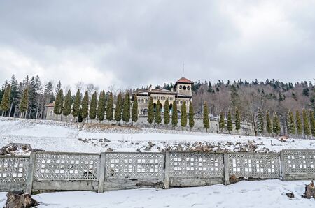The Cantacuzino Palace (Palatul Cantacuzino) from Busteni, Romania, winter time with snow and ice.のeditorial素材