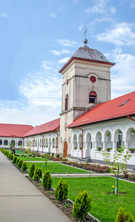 PLOIESTI, ROMANIA - APRIL 22, 2014. The Monastery Ghighiu build in 16 century with miracle icon and healing spring. Exterior detailのeditorial素材