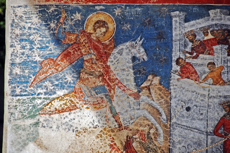 MOLDOVA, ROMANIA - JULY 4,  2014. Visiting the Monastery Voronet. Details of painted exterior walls. Dominant color is well known blue of Voronet.のeditorial素材